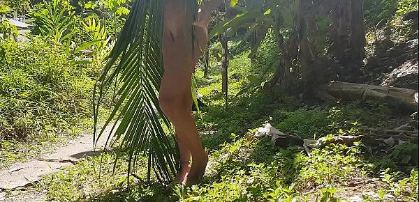  A naked girl is photographed in the wild jungle of the Amazon